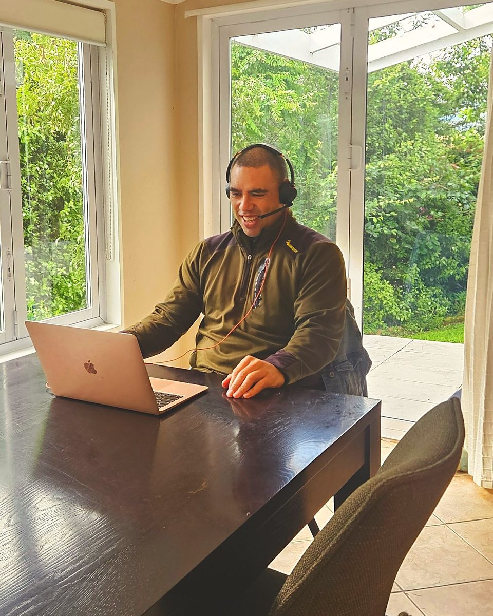Reon from Loud Fox Co on a video call at his laptop